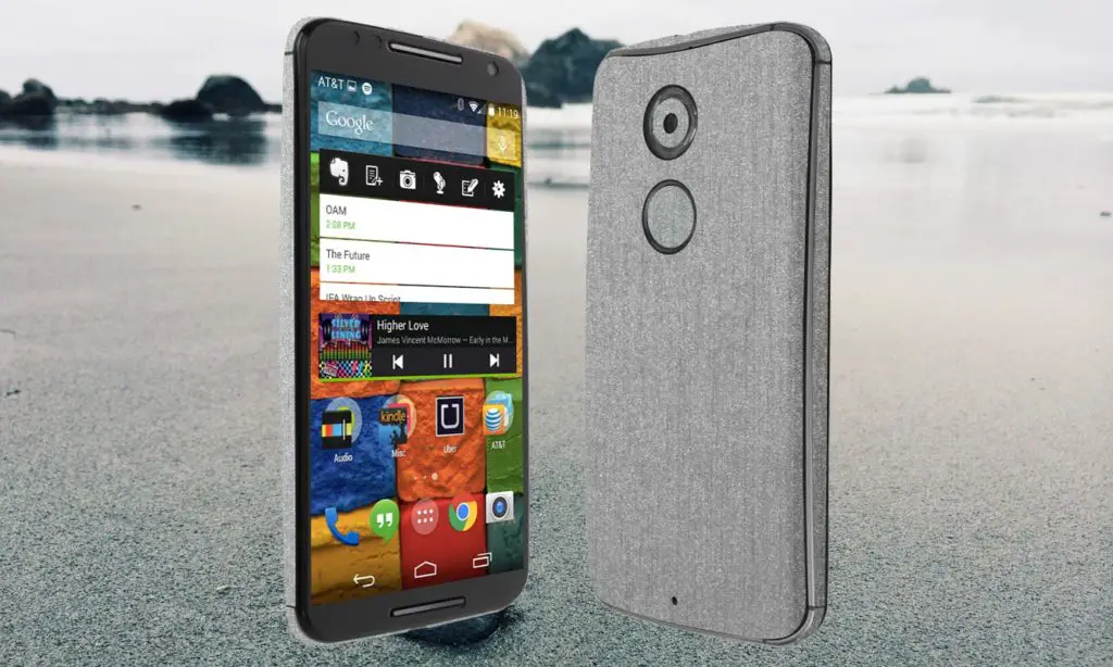 Moto X 2014 With Grey Sand Beach Background