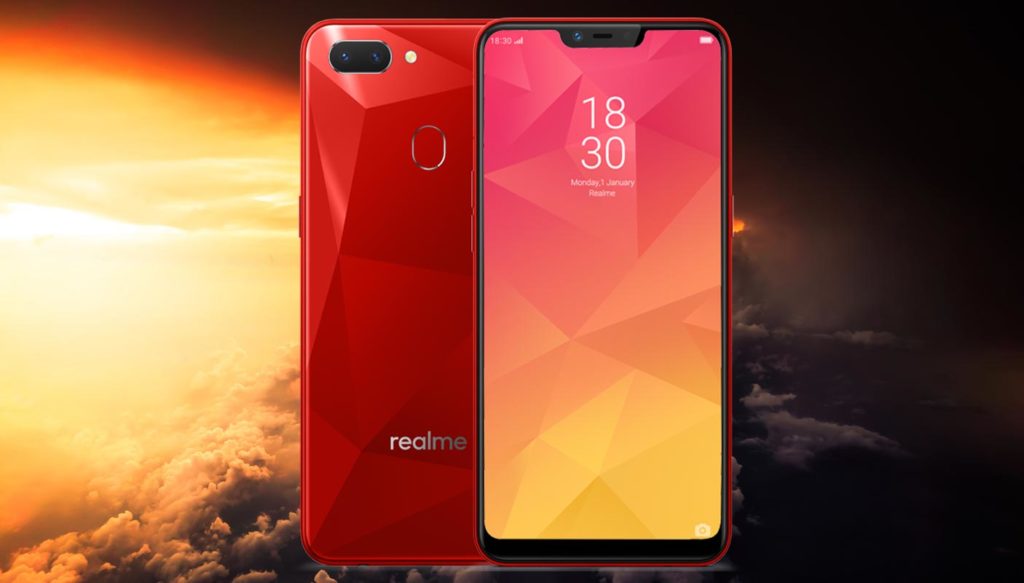 Realme 2 with Sun Rise in the Cloud Background