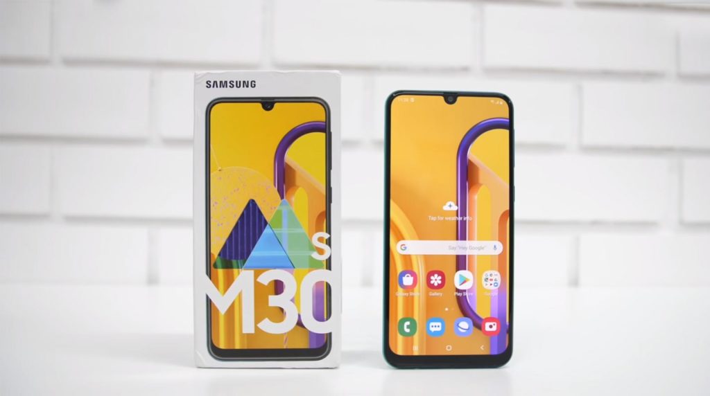 Samsung Galaxy M30s with White Tile Wall Background