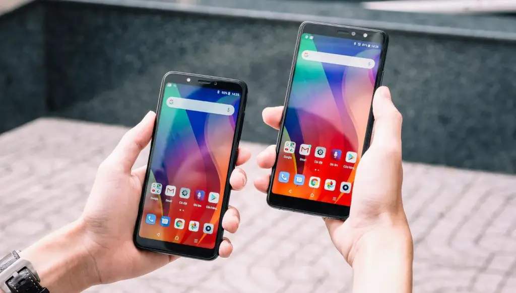 Two Android Phones in Hand