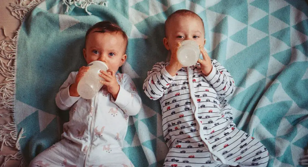 Two Babies Drinking Milk