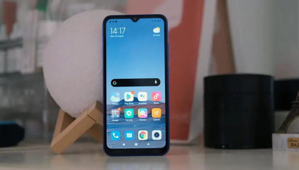 Xiaomi Redmi 9C NFC Home Screen on the Table