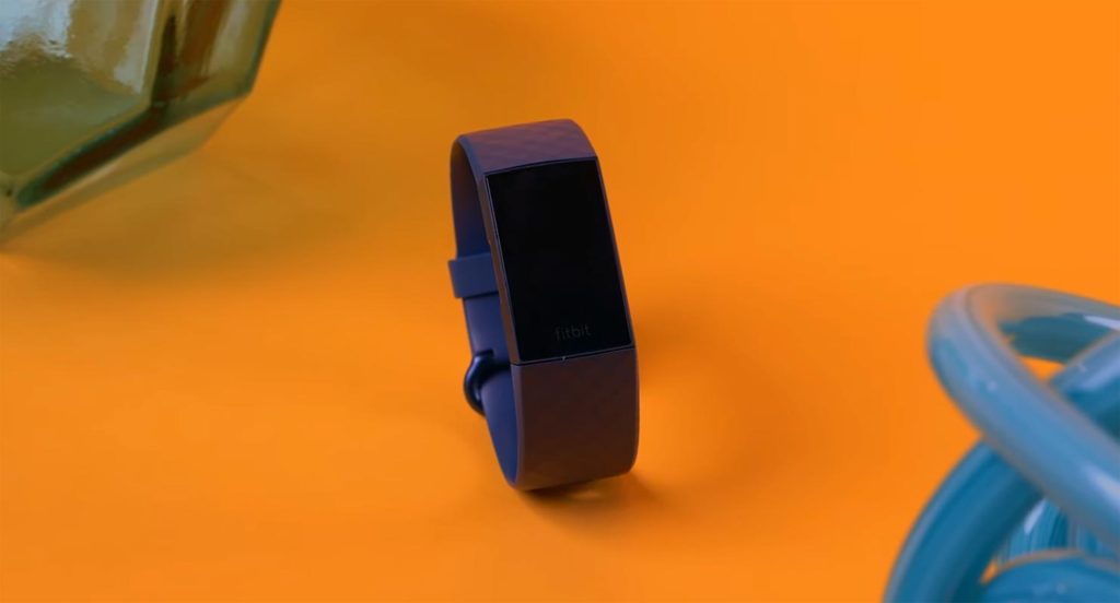 Fitbit Charge 4 on the Orange Color Table