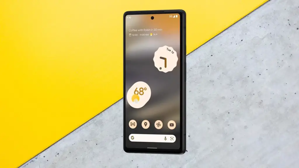 Google Pixel 6a With Cement and Yellow Background