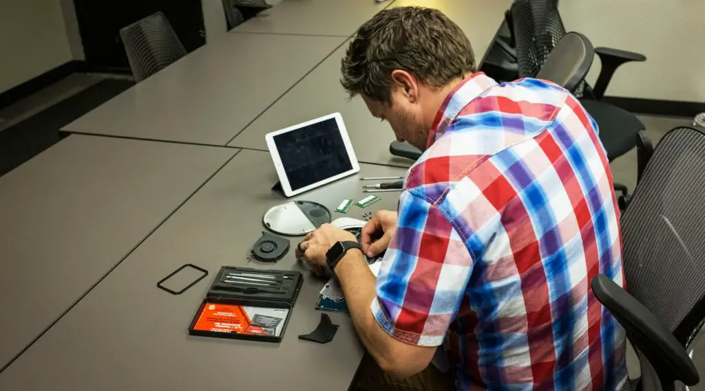 Person Repairing Mobile on his own